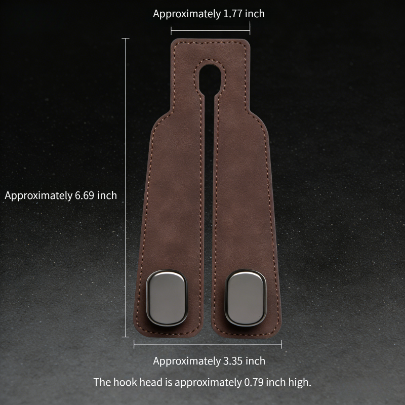 Brown leather car accessory with metal clips, showing detailed product dimensions on black background