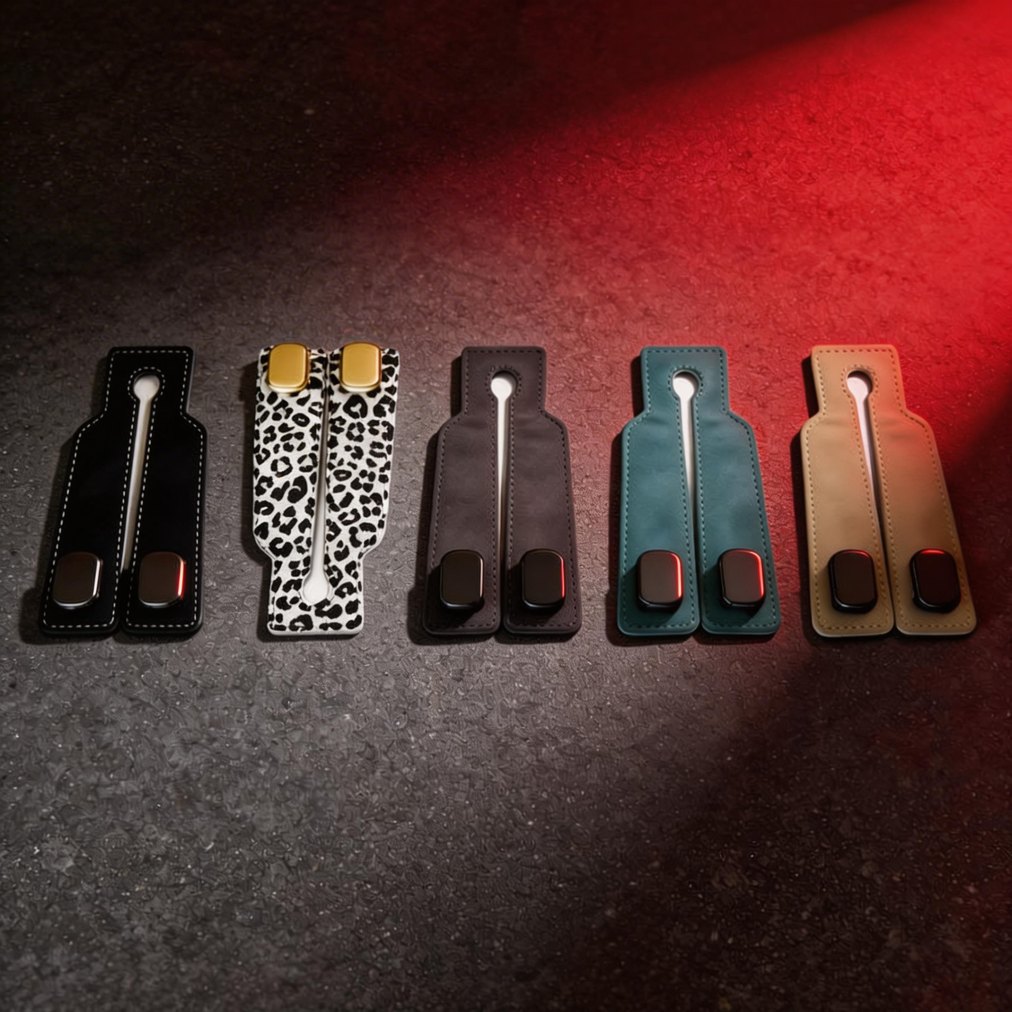 Five stylish car seat gap fillers in black, leopard, gray, teal, and beige on dark ground